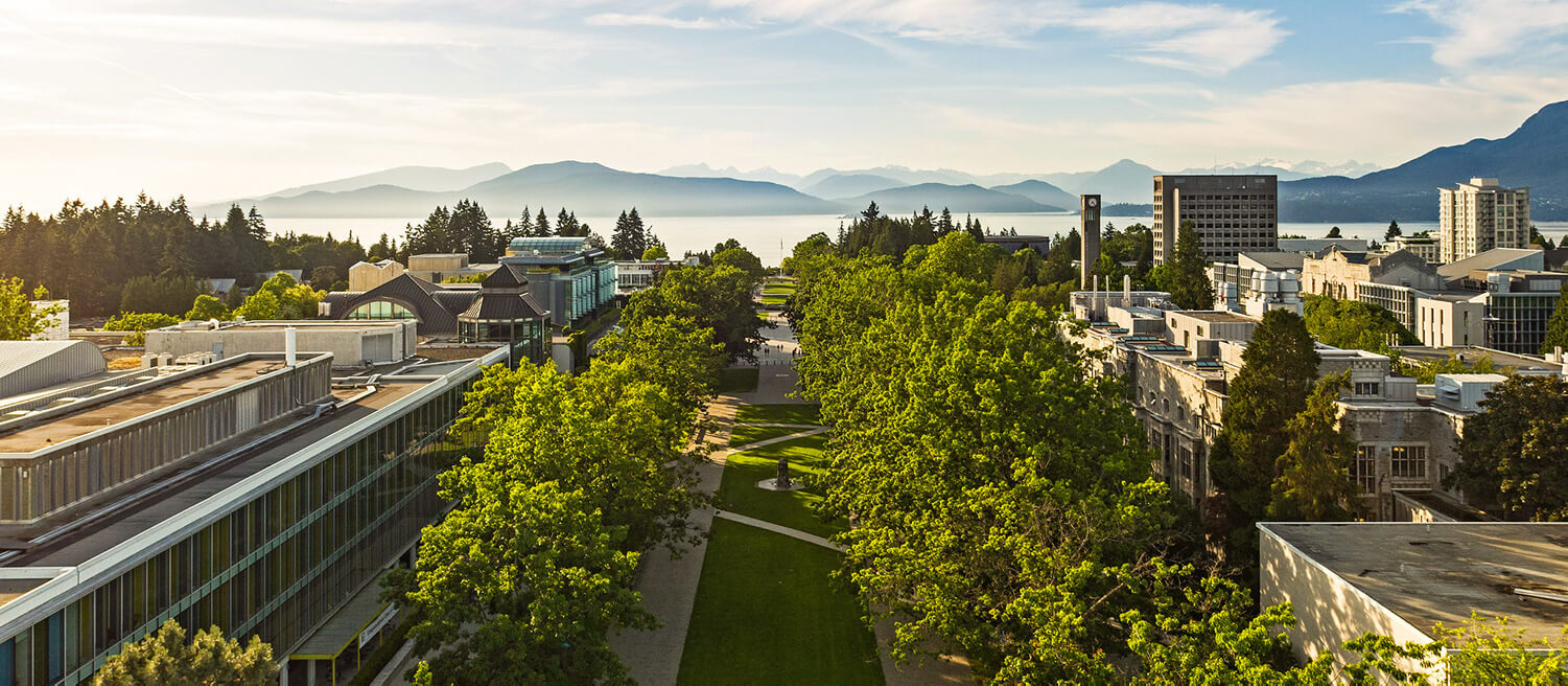 Aerial shot of UBC campus showing mountains in the background