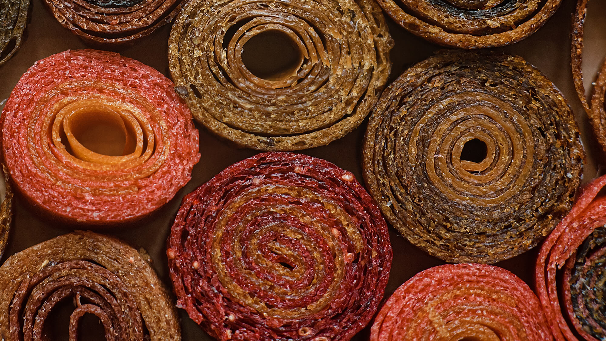 A grouping of fruit leathers made from different fruits